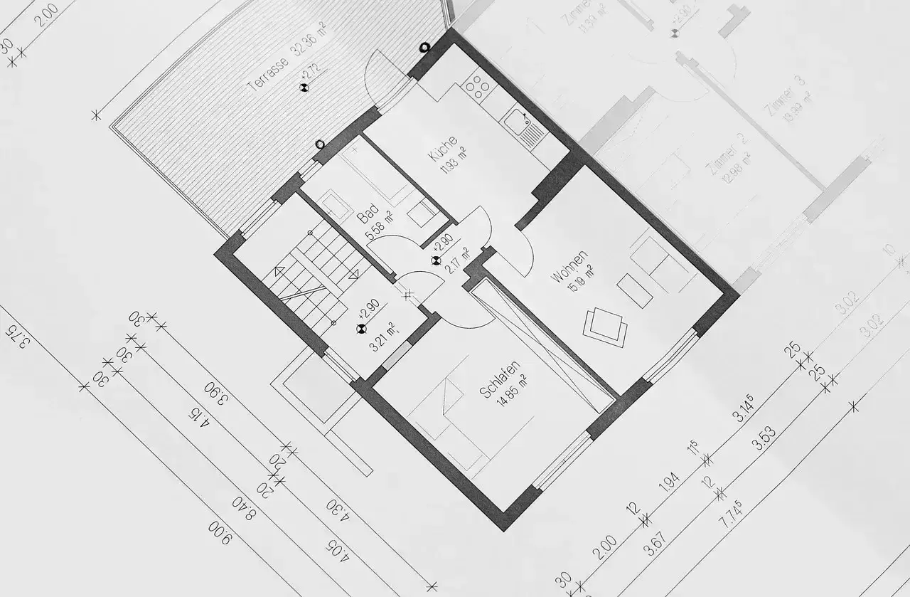 Projekt zagospodarowania terenu z widokiem na rzut parteru domu z kuchnią, salonem, sypialnią i łazienką.